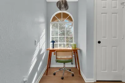 Workspace: A sunny nook with a desk and ergonomic chair, perfect for catching up on emails during your stay!