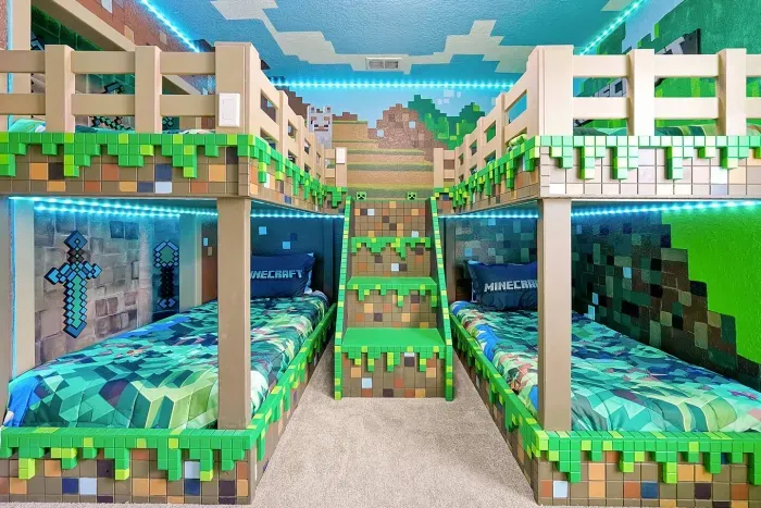 Our Minecraft-themed bedroom is a blast! It’s got four bunkbeds, perfect for kids to dive into the Minecraft world, and for adults who’re just as obsessed. 