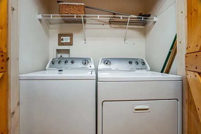 Convenient in-home washer/dryer with added storage shelf