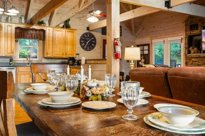 Rustic open-concept cabin with spacious dining and cozy living area