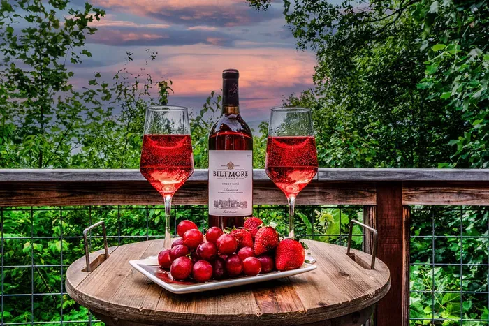 Sunset deck wine setup with forest views and a romantic, private feel