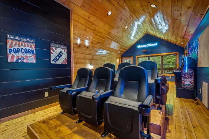 Watch movies or sporting events while the rest of your party shoots pool and plays arcades