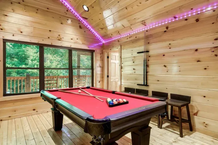 Pool table in game room with stand up arcade not pictured 