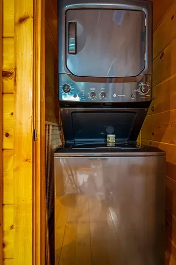 In-cabin stacked washer/dryer for easy mid-stay laundry.