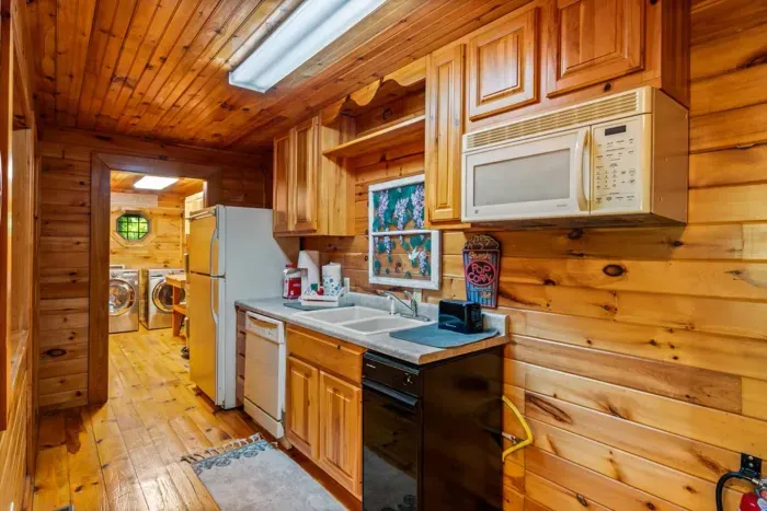 Second kitchen. Cool, clean, and eat downstairs 