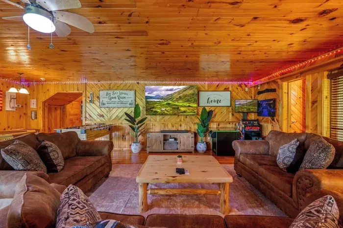 75' TV, sound bar, and arcade