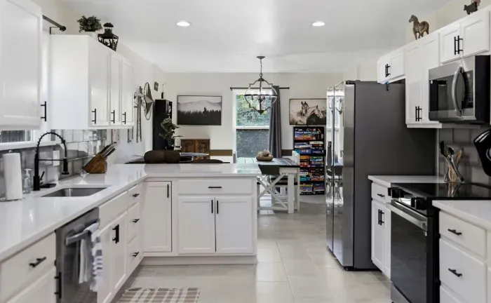 Bright modern kitchen with large island and open dining area