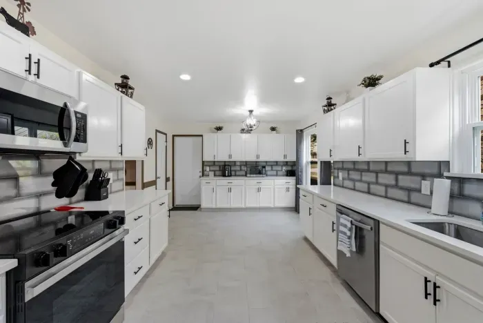 Bright modern kitchen with spacious counters and stainless appliances