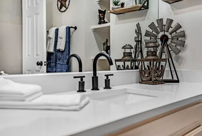 Modern bathroom vanity with rustic decor and polished guest-ready style