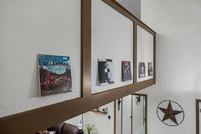 Loft-style wall display with vintage records and cozy rustic charm