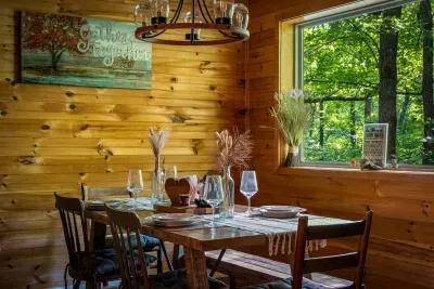 Rustic wood dining nook with forest views and cozy cabin charm