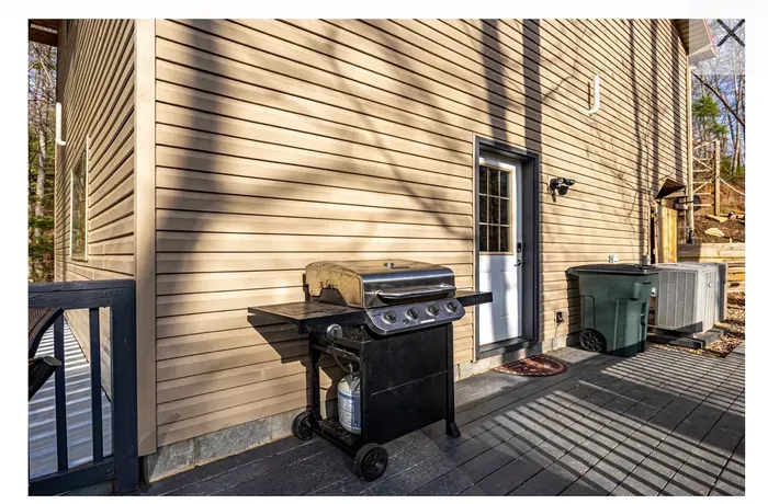Sunny side deck with gas grill—easy outdoor cooking and access