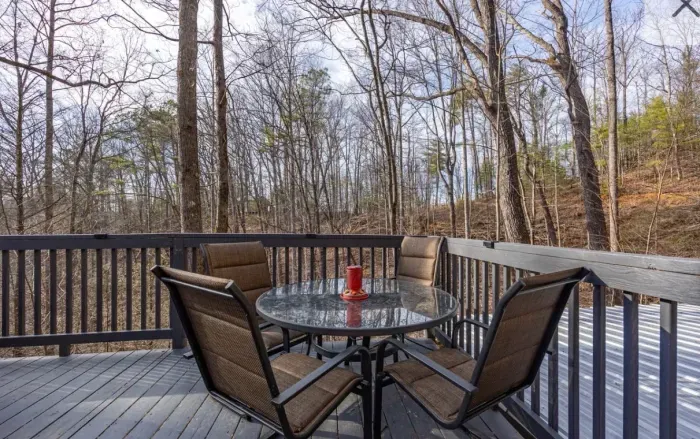 Wooded-view deck with seating—perfect for coffee, wine, and wildlife.
