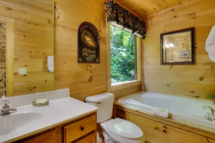 Master bathroom with toilet sink and tub (shower downstairs)