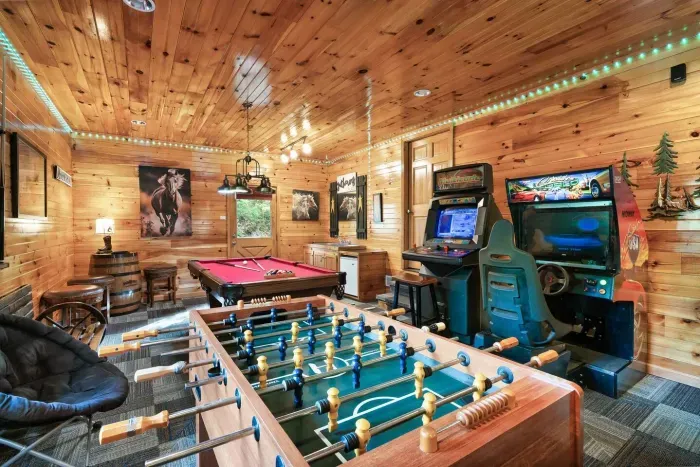 Game room w/billiards, cruisin’ world, multicade, foosball and movie room 