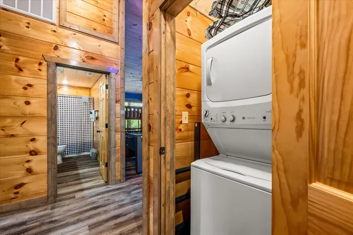 Rustic cabin convenience: in‑unit laundry and bath just down the hall