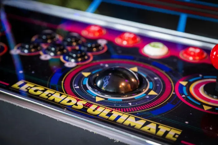 Retro arcade cabinet: joystick, trackball & multiplayer fun