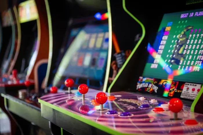 Retro arcade lounge with multiple cabinets for nonstop family fun.