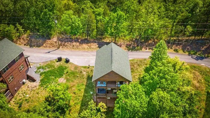 Wooded cabin retreat with covered decks, privacy and easy road access