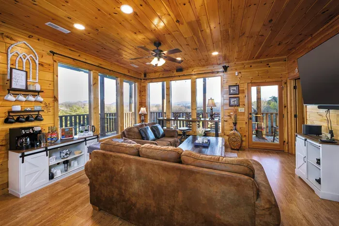 Second floor movie viewing area with streaming TV, coffee bar and natural light