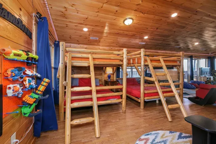 Nerf guns, arcade, and dual bunk beds on third floor 