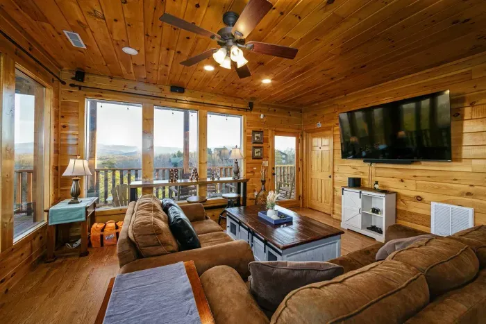 Second floor movie area with farmhouse decor and coffee bar 