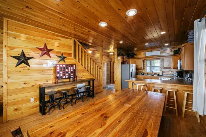 Dining table and two separate bar seating spaces 