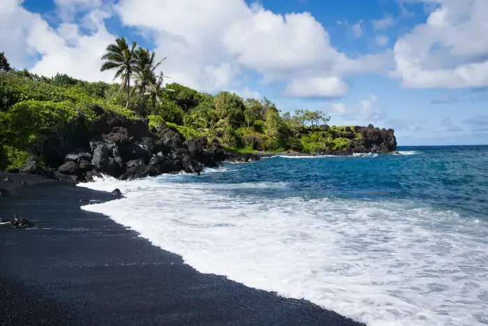 Black sand beaches of Waiʻānapanapa State Park, one of the many gorgeous stops on the Road to Hana.