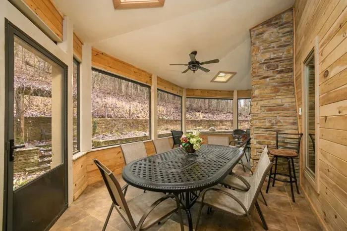 Screened in porch outdoor dining 