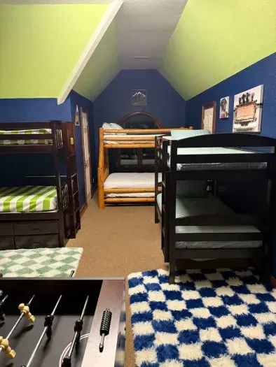 Five bunk beds in loft 

2 full size beds and 8 twin 