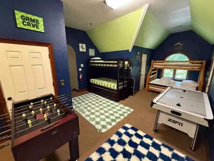 Loft with four sets of bunk beds and two trundle beds 