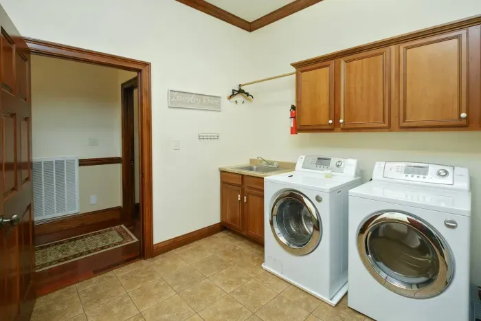 One of two laundry rooms (one upstairs one downstairs)