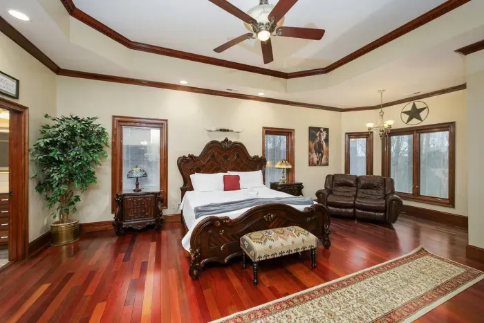 Bedroom one with king bed, two ensuite bathrooms, streaming TV with private entrance and walk in closets 