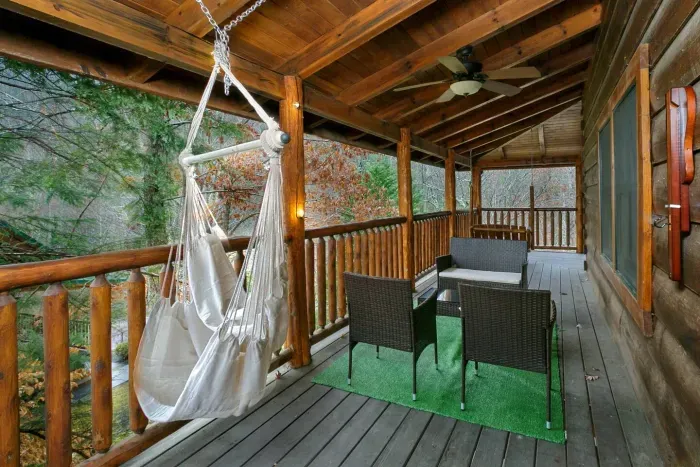 Two hammocks and outdoor seating near hot tub with fun games 