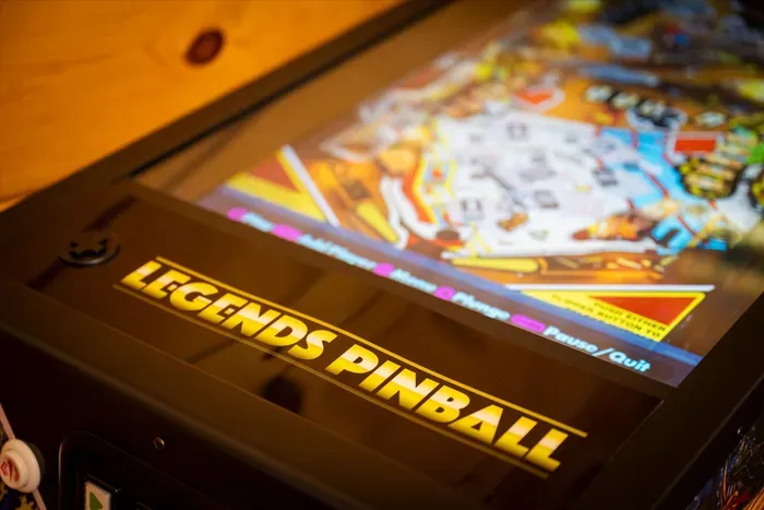 Arcade-style pinball machine for fun game nights at the property