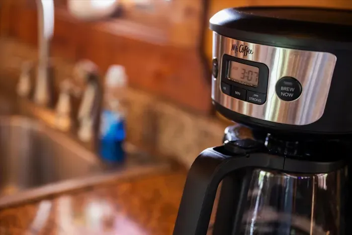 Fresh morning coffee setup in a warm, cozy kitchen