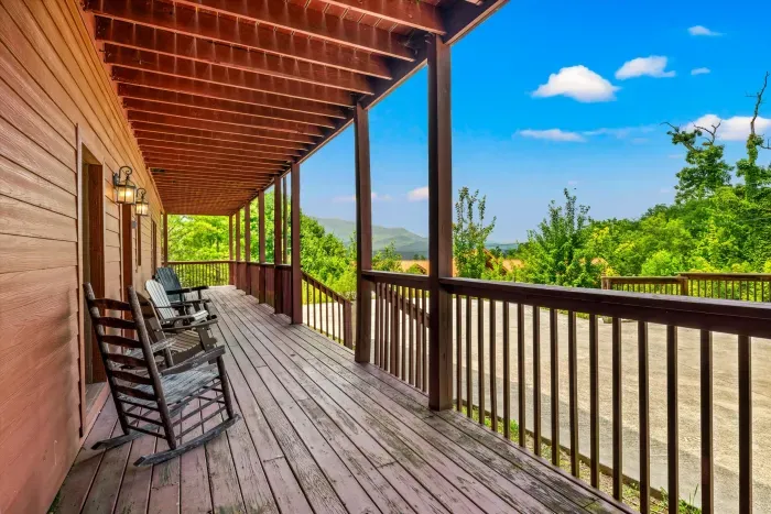 Covered porch with rocking chairs and peaceful mountain-view seating
