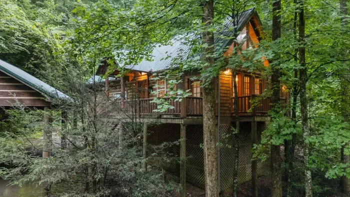 Cozy wooded cabin retreat with a private deck and warm rustic charm
