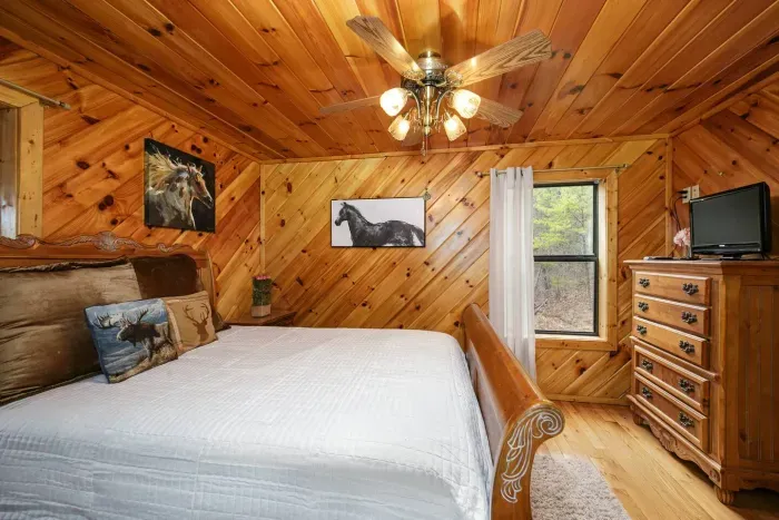 Downstairs bedroom with king bed and en suite bathroom 