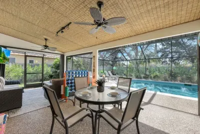 Relax on the lanai and enjoy your morning coffee, al fresco lunch or afternoon snack on the dining table while playing Connect 4 with the kids.