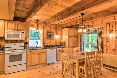 Bright, modern kitchen featuring a dishwasher, full stove, and plenty of counter space.