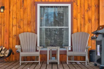 Welcoming Adirondack chairs on the porch—perfect for sipping coffee and savoring the quiet.