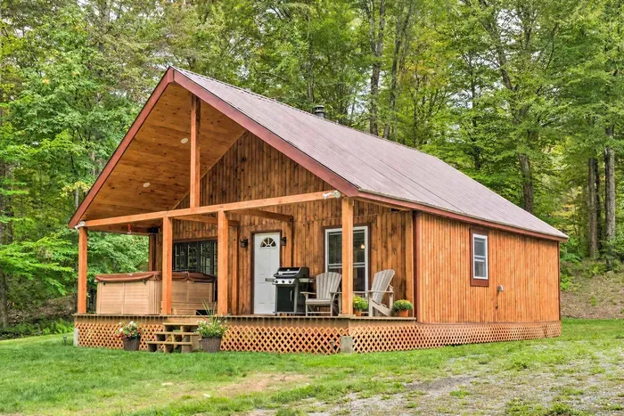 Charming cabin tucked in the trees —sip your morning coffee on the porch, unwind in the hot tub, and soak up the peaceful forest vibes.