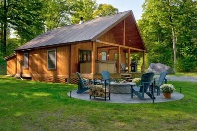 Your Vermont escape—hot tub, fire pit, and peaceful woods just steps from the cabin