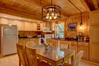 Well-equipped kitchen with ample counter space and all the essentials for easy meal prep during your stay.