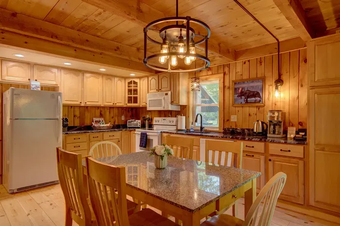 Well-equipped kitchen with ample counter space and all the essentials for easy meal prep during your stay.