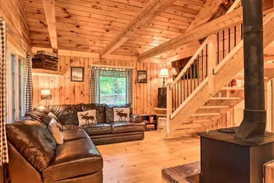 Open and welcoming—your perfect spot to unwind by the fire, stream your favorites, or sink into a good book after a day well spent.
