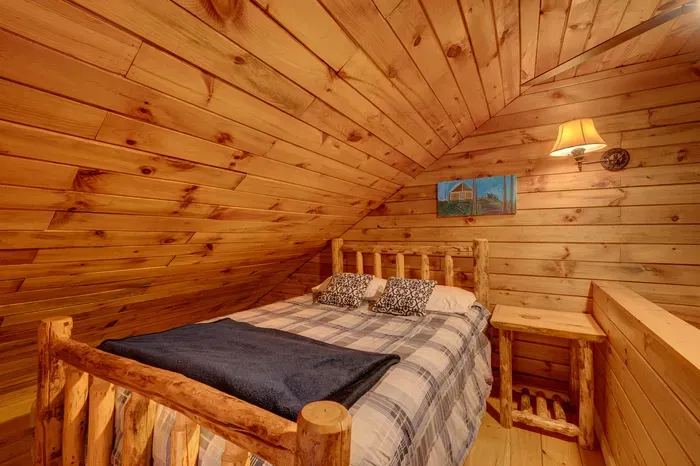 Perched above the main living space, the cozy loft with a queen bed is your invitation to serenity and sweet dreams.