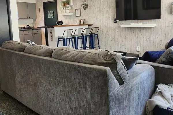 Holy Cow Main Floor Living Area | Smart TV | Breakfast Bar Area