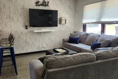 Holy Cow Main Floor Living Area | Smart TV | Breakfast Bar Area